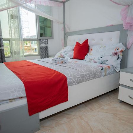 The City Block Apartment บุจัมบุรา ภายนอก รูปภาพ