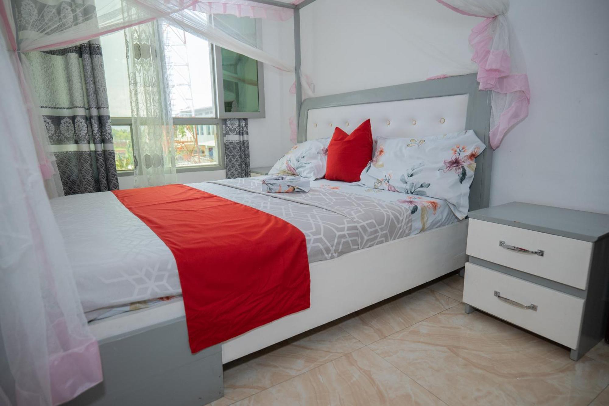 The City Block Apartment บุจัมบุรา ภายนอก รูปภาพ